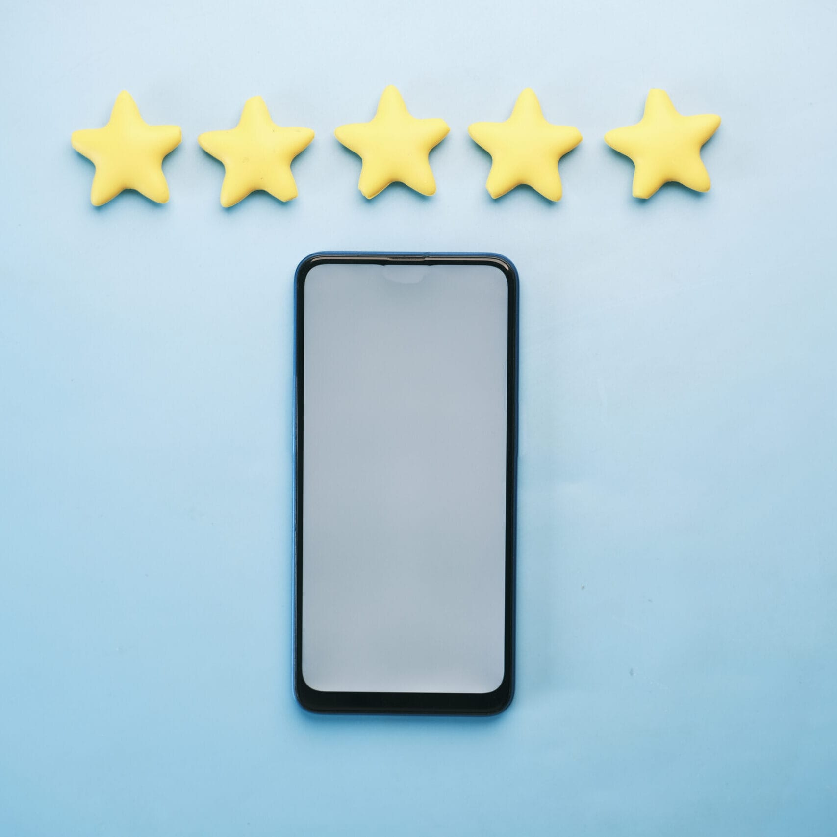 Rating golden stars and a smart phone table visibilità sito web